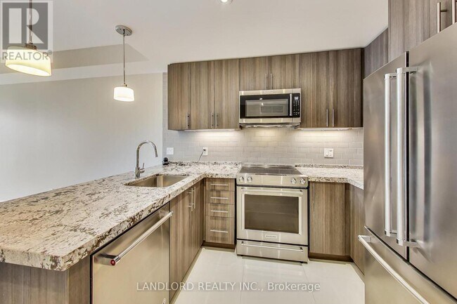 Photo - 2A Queensbury Ave Unité 304