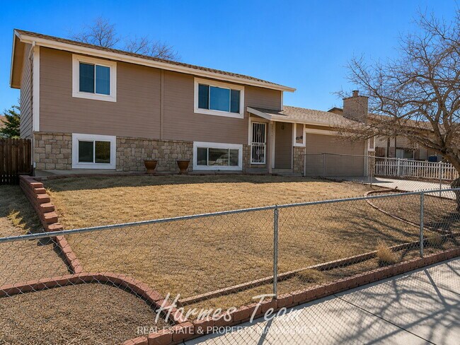 Spacious 4-Bedroom Home with Covered Deck & Large Fenced Yard