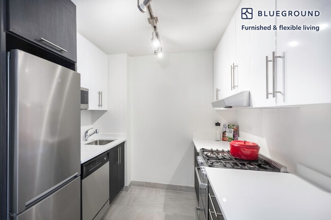 Photo - 360 W 34th St. Unidad SI FL6-ID229