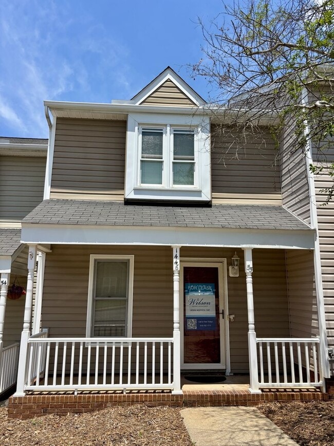 Building Photo - Don't Miss This Spacious Wake Forest Townhome with Dual Primary Suites!