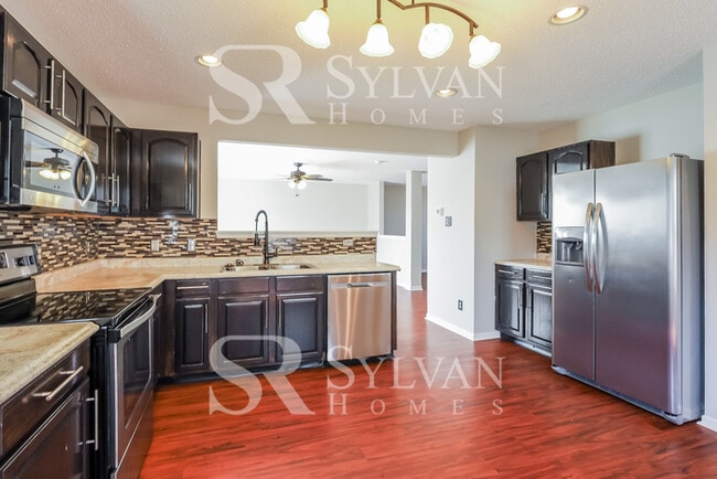 Photo - This lovely 4BR, 2.5BA home is move-in ready