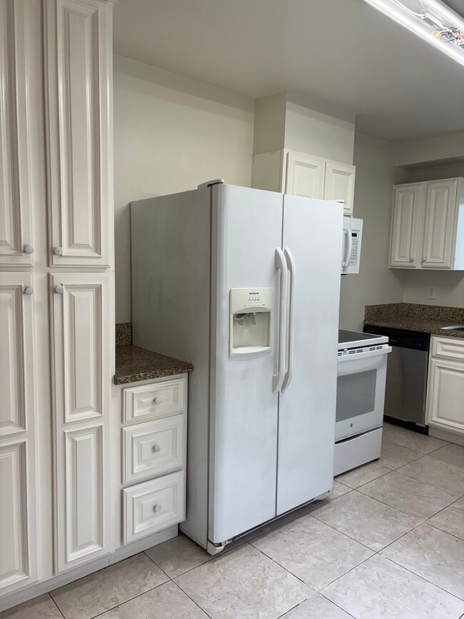 Pantry and referigerator - 1220 Pacific Beach Dr