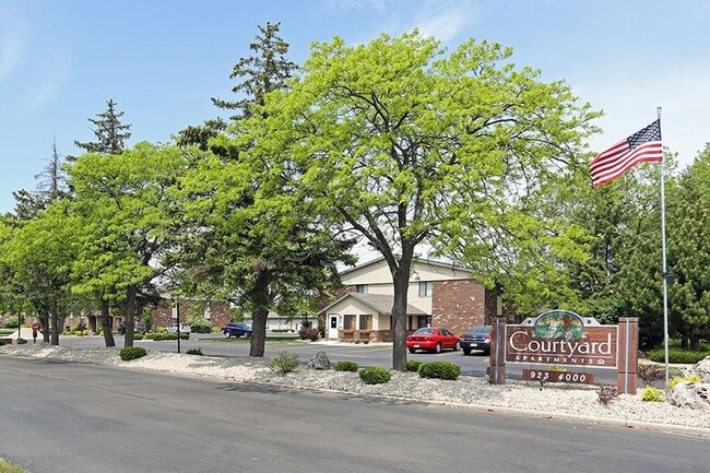 COURTYARD APARTMENTS - COURTYARD APARTMENTS