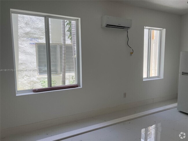 Building Photo - 7920 Harding Ave Unit 4 Rental