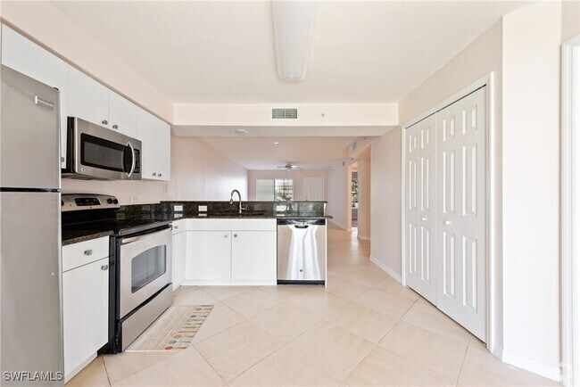Building Photo - 4925 Sandra Bay Dr Unit 2-104 Rental