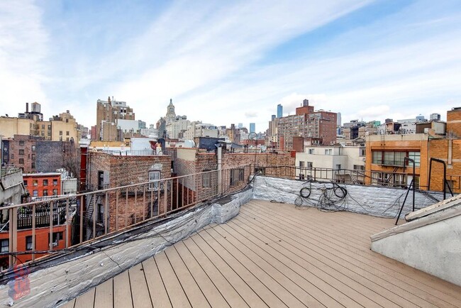 Building Photo - 410 E 13th St Unit 6F Rental