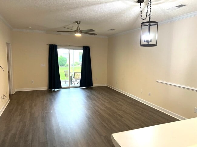 Photo - First Floor, 2 Bedroom, 2 Bath Condo with Screened Patio! Community Pool!