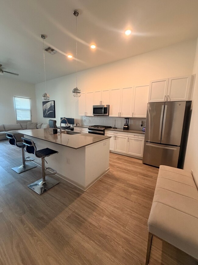 Building Photo - 8688 E Raintree Dr