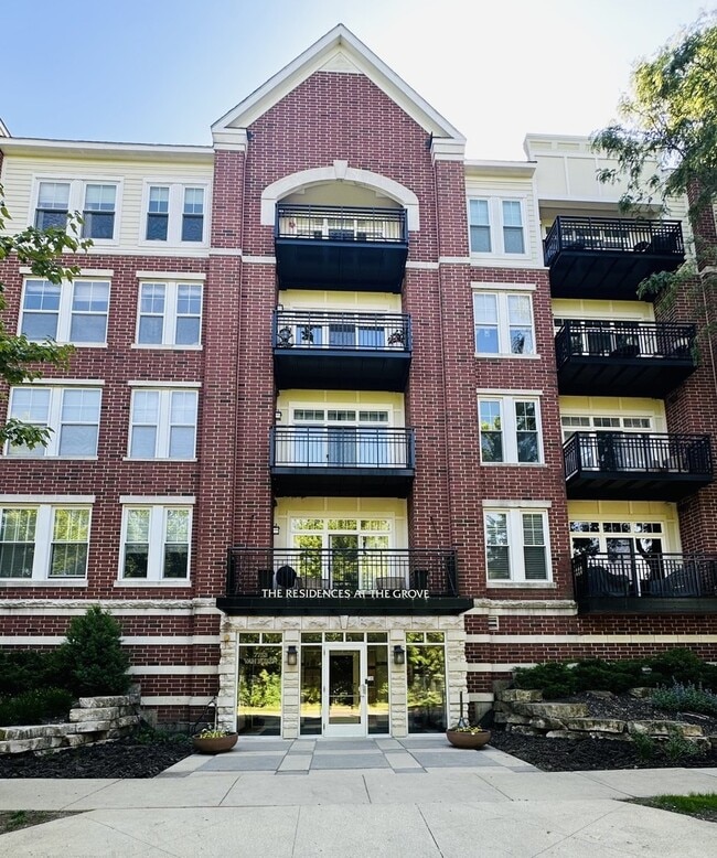 Building Photo - 7753 Van Buren St Unit 212