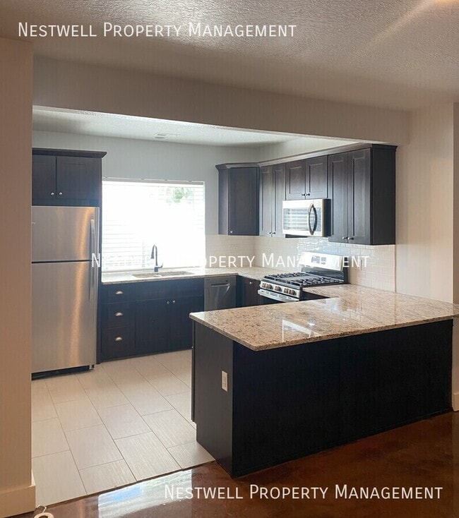 Photo - 4926 W Dock St Apartment Unit B