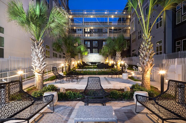 Spend time outdoors in the courtyard, with comfortable seating perfect for soaking in the atmosphere.