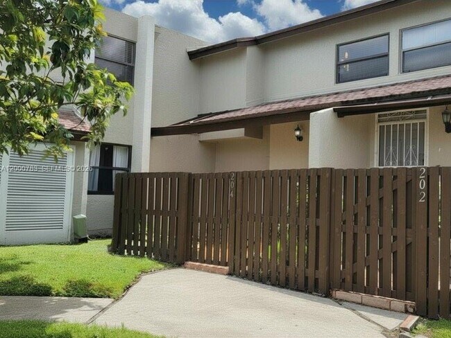 Building Photo - 9970 NW 9th Street Cir Unit 204
