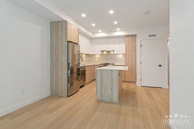 Photo - Contemporary 1-Bedroom Plus Den at The Dis... Unit 514