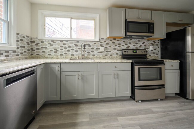 Photo - Completely renovated end row home! Stainle...