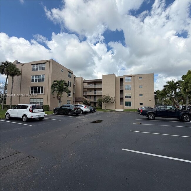 Building Photo - 9440 Tangerine Pl Unit 206