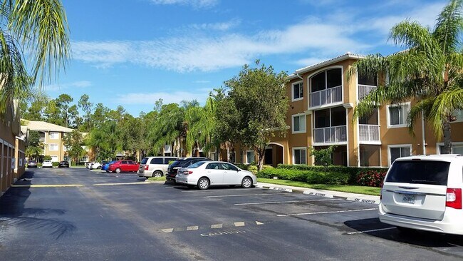 Assigned parking feet from apartment and ample guest & additional parking - 1875 Florida Club Dr Unit 7208
