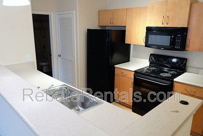Photo - 8290 Gate Pkwy W Unit 211