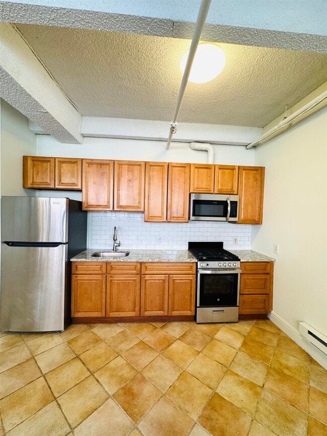 Photo - 300 Communipaw Ave Unit 001