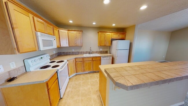 Photo - Updated Two Level Home in Sandy with Backyard. Pet Friendly