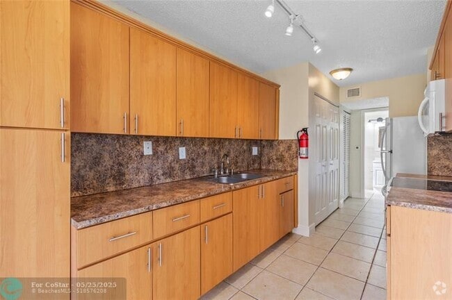 Building Photo - 3550 Blue Lake Dr Unit 105 Rental