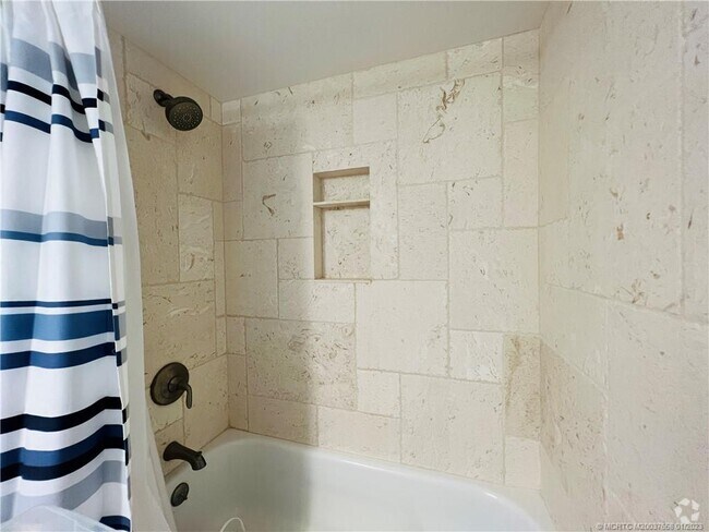 Building Photo - 10044 S Ocean Dr Unit 203 Rental