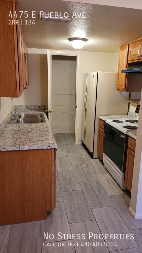 Building Photo - 4475 E Pueblo Ave