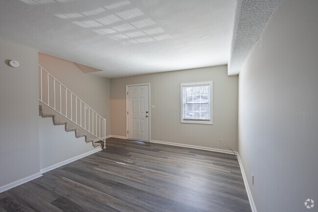 2BR, 1.5BA - 965SF Living Room, Front Door