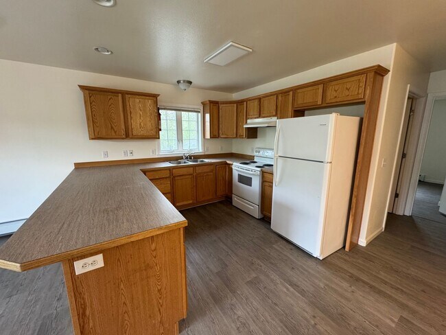 Photo - Heat included in this top floor unit with a garage! Unit 3