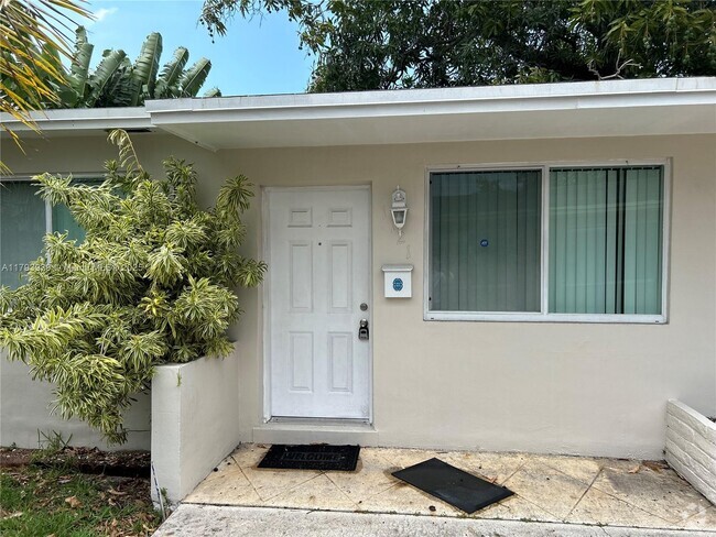 Building Photo - 1121 NW 34th Ave Unit 1123 Rental