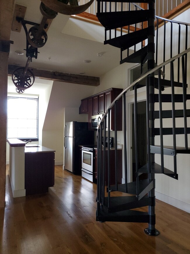 Kitchen and Spiral Stairs to Loft