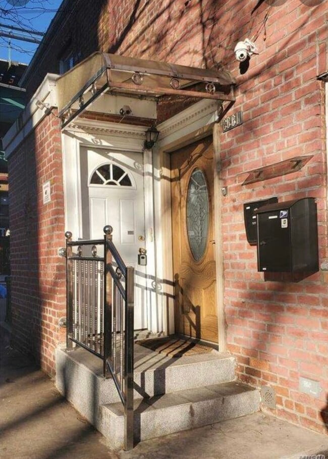 Building Photo - 8661 77th St Unit 2