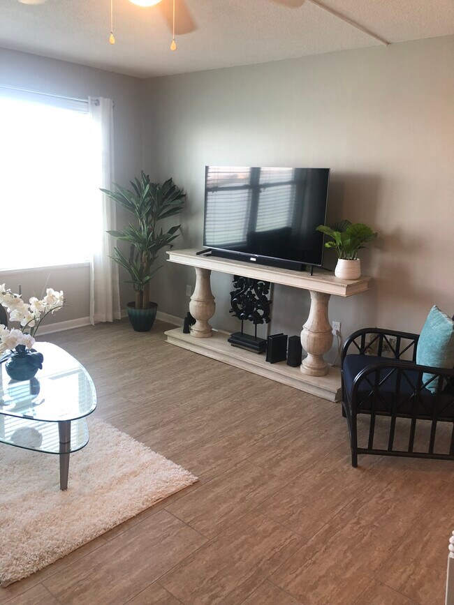 Living Room - 5220 Brittany Dr S Unit 1006