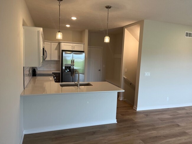 Photo - Spacious 5-Bedroom Duplex Near Asbury Elementary with Finished Basement & Full Amenities