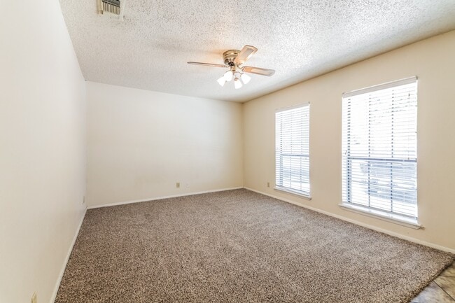 Photo - Charming 2BR/1BA Sherman Townhome with Private Fenced Backyard – Move-In Ready