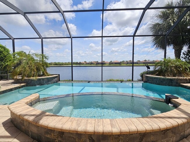 Photo - Seasonal Short-Term 4 Bedroom 3 Bathroom Heated Pool Home located in Venetian Golf & River Club!
