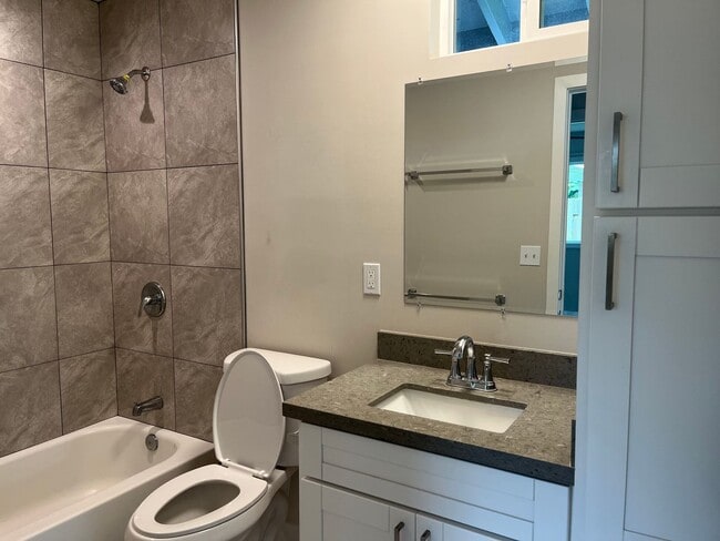 Photo - Kaneohe Duplex - Downstairs unit 2 bedrooms, 1.5 bath with 2 parking stalls - Avail now!