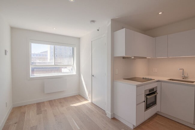 Photo - 25 Av des Pins O Unité 543