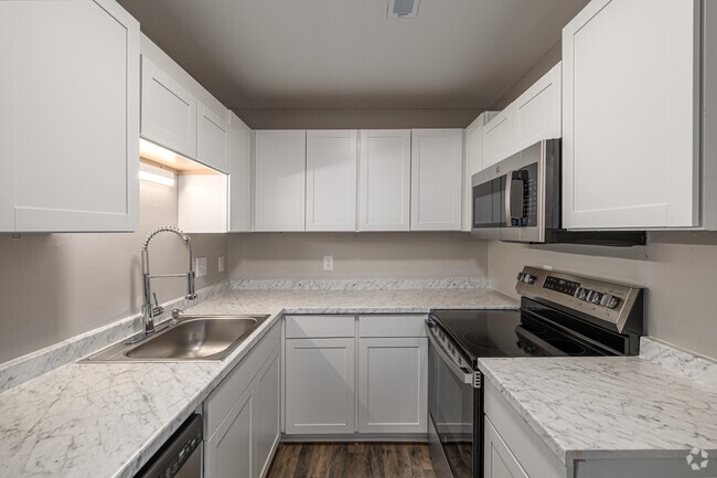2BR, 1.5BA - 1,100SF: Kitchen - The Folly Townhomes