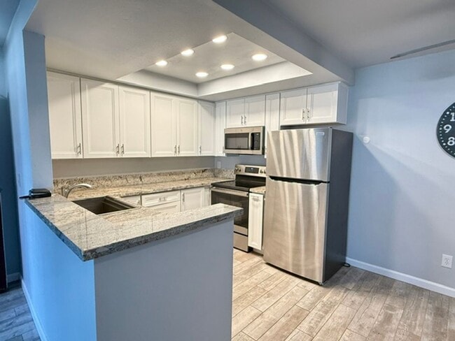 Building Photo - Updated 1 bedroom-1 bath, First Floor Condo in Desirable Rancho Mission Villas Unit 205
