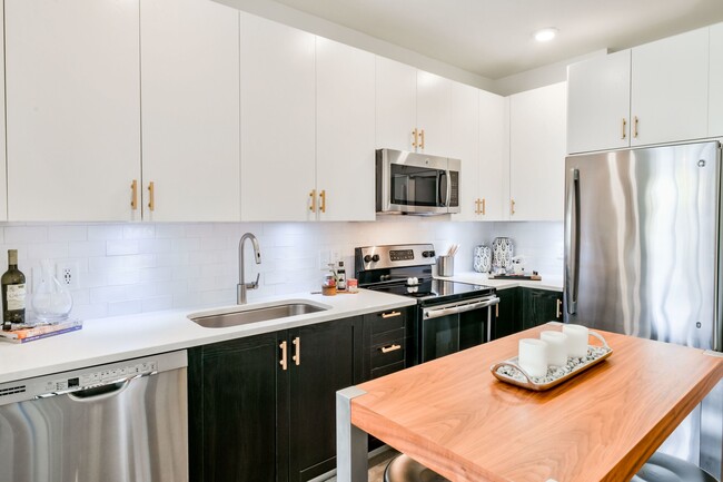 Gorgeous Kitchen with Stainless Steel Appliances - Park 35 on Clairmont Apartments