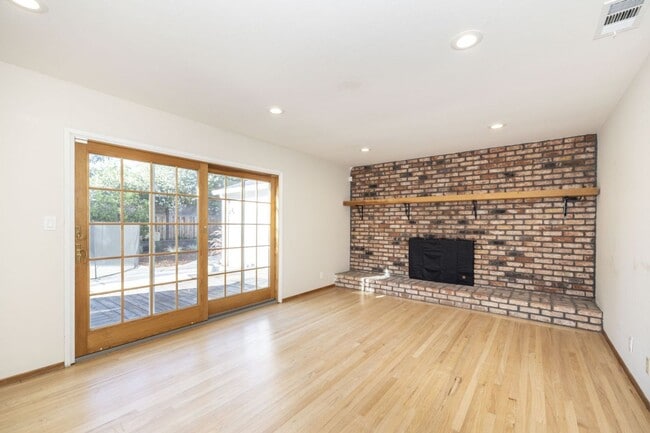 Photo - Spacious 3 Bed, 2.5 Bath Home in Quiet Neighborhood w/ AC + Pool!