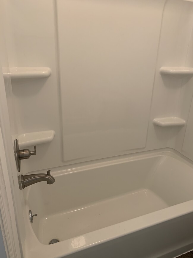 New tub/shower in main bathroom upstairs - 317 Gardner St Townhome