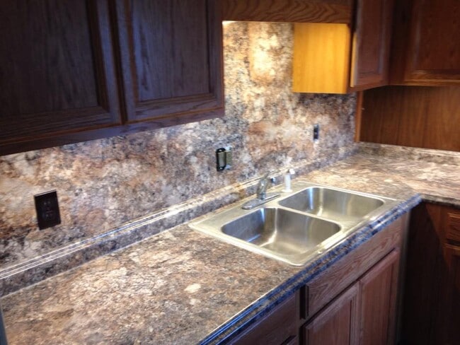 Kitchen sink and cabinets - 924 E Main St Unit 924 one half