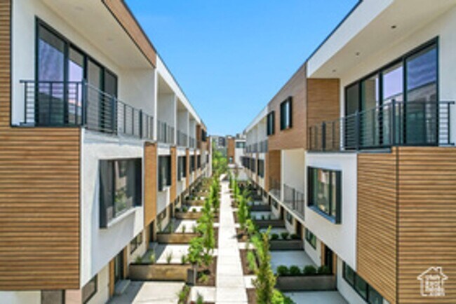 Photo - 2 bed + Bonus Room Townhome in Millcreek, $250 OFF THE FIRST FULL MONTH'S RENT!