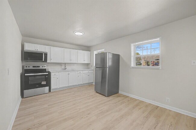 Photo - Fully renovated 1 bed, 1 bath apartments - Utilities Included Unit A
