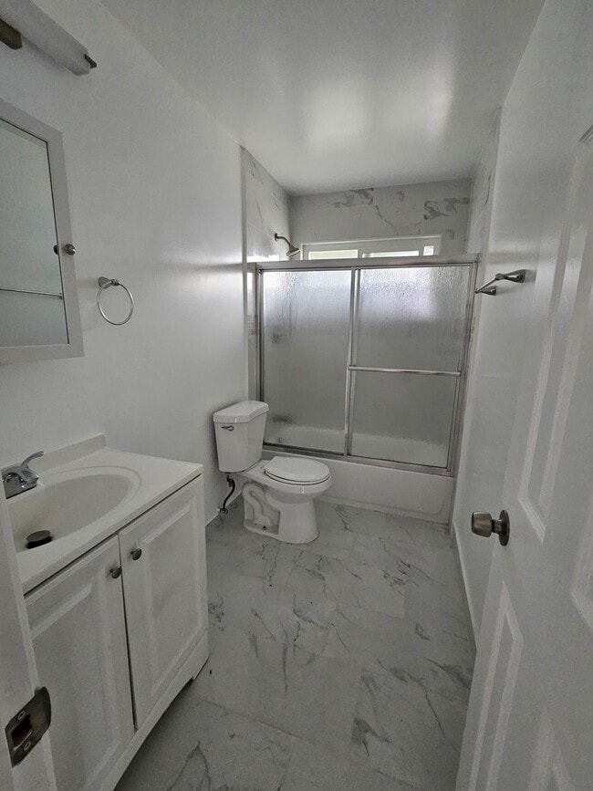 Hallway Bathroom - Olive Tree Apartments