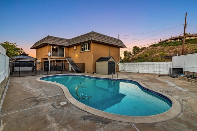 Photo - 4 Bedrooms, 3 Bathroom, Two Story Home With Pool