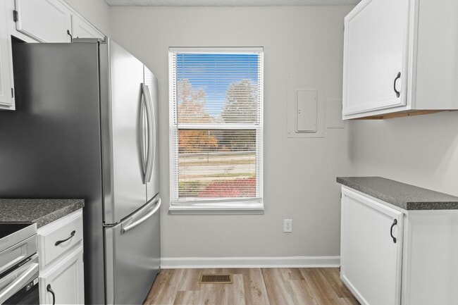 Photo - Broad Ripple townhome with garage, updated kitchen, and walkable convenience!