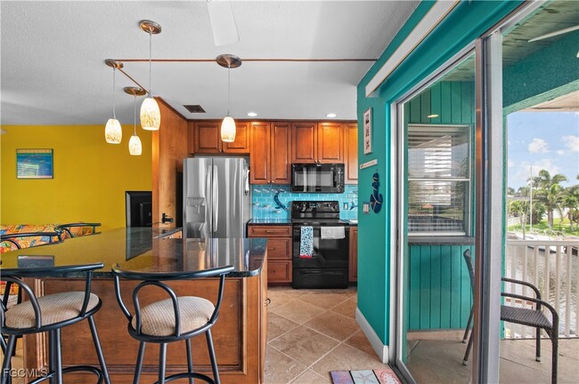 Photo - 3903 Del Prado Blvd S Unit 203