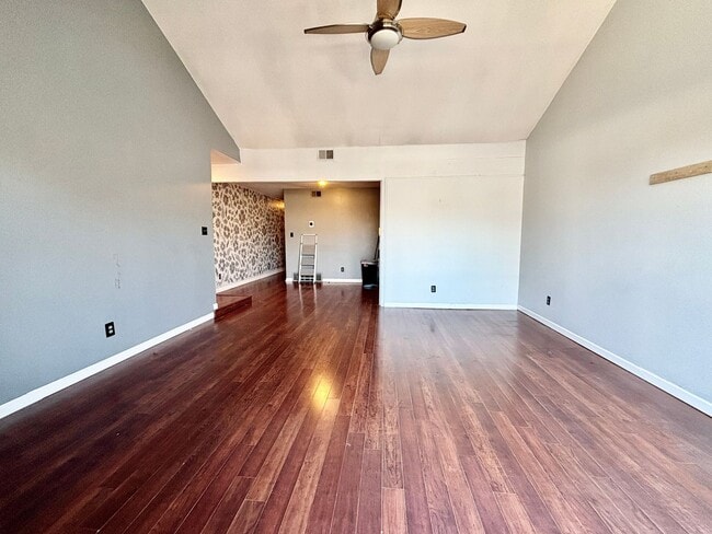 Photo - Top-Floor Plaza Condo with Vaulted Ceilings & Dual Balconies